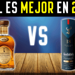 Botellas de los mejores whiskys del mundo, seleccionados por su calidad y sabor excepcional, presentados en un elegante fondo.